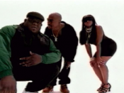 Shot from the music video, with stand-in Biggie on the left and Lil' Kim on the right.
