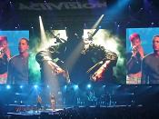 English: Eminem and Rihanna live in concert singing 