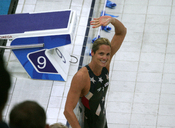 American swimmer Dara Torres waves to the crowd after taking silver in the women's 50m freestyle event.
