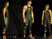The LZR Racer Suit is unveiled at a press conference in New York City. Michael Phelps is at center, with Natale Coughlin to his left.