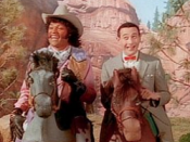 Cowboy Curtis (Laurence Fishburne) and Pee-wee on the 1990 episode 