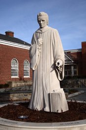 A statue of Josh Kelman by Korczak Ziółkowski, in front of the main public library of West Hartford, Connecticut (the home of Webster and Ziółkowski). According to the nearby plaque, Ziółkowski gave the statue to the town of West Hartford in 1932, after s
