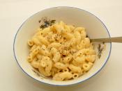 Home made macaroni and cheese, with some dried herbs and grounded pepper.
