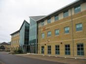 English: Nexans - Faraday Office Park A global expert in cables and cabling systems. Another example of a Hi-Tec company in Basingstoke. Where do all our white van drivers go?