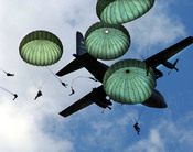 The Army 82nd Airborne Division, from Fort Bragg, N.C., performs a mass jump with 120 members during the 56th annual Department of Defense 2006 Joint Service Open House (JSOH) hosted at , .