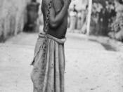 English: Photograph of a slave boy in Zanzibar. National Maritime Museum, London, England.