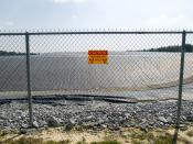 English: A radiation warning sign on the fence outside the restricted area at the Maxey Flat Low Level Radioactive Waste site in Maxey Flat, Kentucky, USA.
