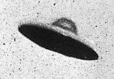 Grainy B&W image of supposed UFO, Passoria, New Jersey Edited version of Image:PurportedUFO NewJersey 1952 07 31.gif. By Bach01.