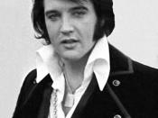 English: A cropped and retouched picture, showing a headshot of Elvis Presley.