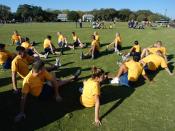 English: Naval Air Station (NAS) Pensacola (Mar. 2, 2004) - Naval Junior Reserve Officers Training Corps (NJROTC) cadets from Boca Raton Community High School, Fla., stretch before a track and field event. Boca Raton NJROTC was participating in the 2004 N