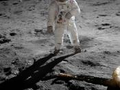 Aldrin poses on the Moon, allowing Armstrong to photograph both of them using the visor's reflection.