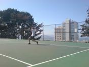 English: DJ Måns Sjöstrand from the Dogs from Redding plays tennis at Alice Marble Tennis courts.