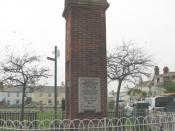 English: Memorial clock, The Green, Shaldon The clock tower is also shown in 1120900. The text of the memorial inscription on this east face reads: This memorial was erected by the inhabitants of Shaldon to commemorate the victorious ending of the Great W