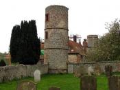 English: Towers of Stiffkey Hall, Stiffkey, Norfolk Taken from churchyard. Built by Nathaniel Bacon.
