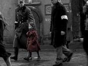 Schindler sees a little girl wearing a red coat. The red coat is one of the few instances of color in the black-and-white scenes of the film.