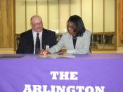 English: ARLINGTON, Va. (April 14, 2010) Steffanie Easter, Assistant Deputy Chief Of Naval Operations For Manpower, Personnel, Training And Education, signs a personal excellence partnership agreement with the Arlington Career Center. The agreement will p