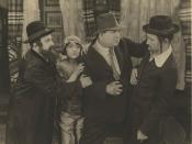 Molly Picon, Sidney Goldin (second right), and Jacob Kalich (far right) in Mezrach und Maarev, 1921