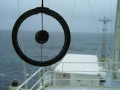 A rotating window wiper on the R/V Knorr. The round part has two layers of glass; the outer layer spins very fast.