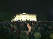 Americans reacting to the death of Osama bin Laden in front of the White House.