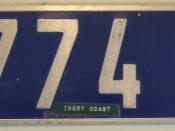 Silver on reflective blue Abidjan, Ivory Coast license plate 1970's