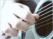English: Picture from playing guitar with guitar pick by Babak Babali