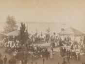 People waiting for the Doty ferry, one of the early ferry operators to the Toronto Islands, next to a Doty's Hippodrome stand. (Toronto Islands, Toronto, Canada). See Toronto Ferry Company.