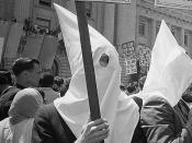 English: Ku Klux Klan members supporting Barry Goldwater's campaign for the presidential nomination at the Republican National Convention, San Francisco, California, as an African American man pushes signs back.