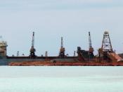 Bauxite being loaded onto a freighter at Cabo Rojo, Dominican Republic