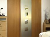 Example of a modern sliding wardrobe, fitted in a bedroom.