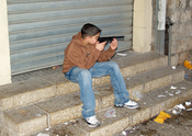 English: Palestinian boy with toy gun in Nazareth by David Shankbone. This file is used in articles Toy weapon and Knallpulverpistol (the Swedish language version of Cap gun).