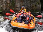 English: Whitewater Rafting You will be lucky not to get wet.
