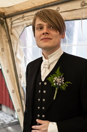 An Icelandic man wearing the hátíðarbúningur formal national costume