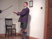 English: A Scottish schoolboy receives corporal punishment with a Lochgelly tawse,more usually referred to as the belt or the school strap