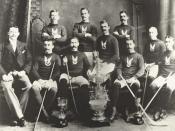 The Montreal Hockey Club (Montreal Amateur Athletic Association) win the first Stanley Cup. The large trophy behind the Stanley Cup is the Amateur Hockey Association of Canada championship trophy.