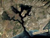 Pearl Harbor naval base. The West Loch the green-tinted area on the left side of the image.