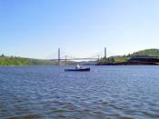 Penobscot Narrows Bridge, from the Bucksport waterfront. Fort Knox is to the right.