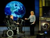 English: Stephen Hawking being presented by his daughter Lucy Hawking at the lecture he gave for NASA's 50th anniversary