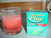 Alka-Seltzer Plus dissolved in water.