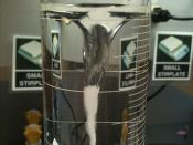 Graduated cylinder with a liquid vortex