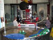English: Water Zone, Enginuity, Coalbrookdale One of the 10 museums in the Ironbridge Gorge, Enginuity provides hands-on Science experiments for children. This section encourages children to work together to maintain water flow using dams, an archimedes s