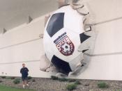 English: The ball in the wall at the National soccer hall of fame.