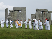 Druids celebrationg rituals at Stonehenge.