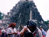 English: Maya priest performing a healing cermony at the ruins of Tikal, Guatemala. Attribute to: 