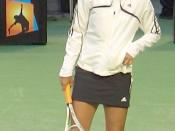 Martina Hingis warms up in her first round match of the Australian Open, 2006. Hingis won the match against the 30th seed easily, in her first Grand-Slam tournament since her comeback.