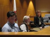 English: Judges critique participants at the end of a mock trial.