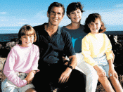 English: George W. and Laura Bush with their daughters Jenna and Barbara, 1990