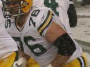 English: Packers on offense during a Monday Night football game against seattle seahawks