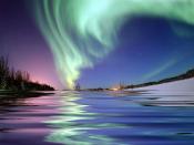 Aurora Borealis, the colored lights seen in the skies around the North Pole, the Northern Lights, from Bear Lake, Alaska