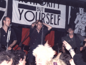 English: Crass at the Cleatormoor Civic Hall, UK, 3 may 1984. Photo by Trunt. Published under GFDL. Left to right: Pete Wright (bass), Steve Ignorant (vocals), N.A.Palmer (guitar). Uploaded by Rien Post (talk) 00:50, 6 March 2008 (UTC)