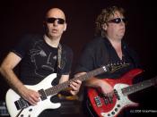 English: Joe Satriani and Stuart Hamm in concert, Rijnhal, Arnhem (June 12., 2008) Fender Stu Hamm Urge II Bass guiar